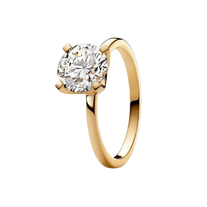 Gold ring with a large diamond on a white background