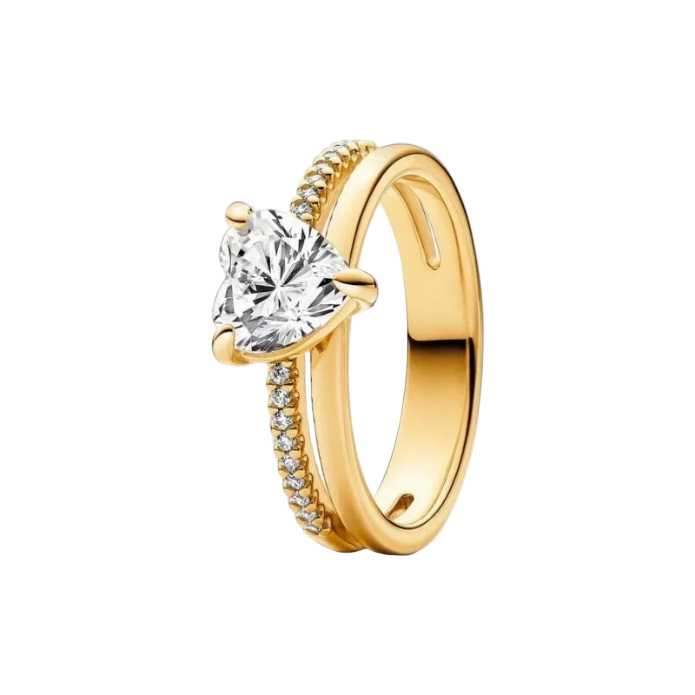 Gold ring with a large diamond and smaller diamonds on the band against a white background