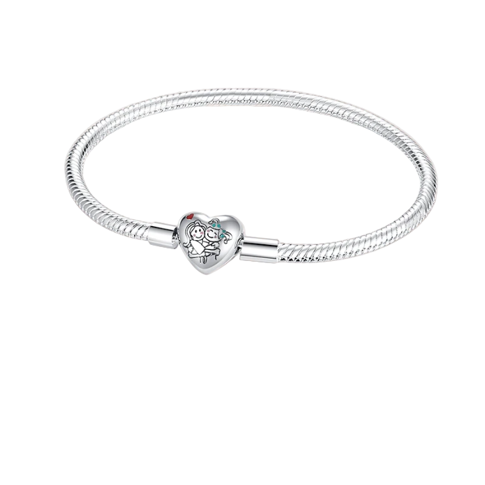 Silver bracelet with a heart-shaped charm featuring two people on a white background