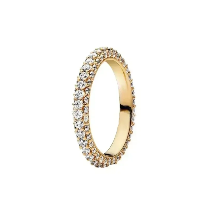 Gold ring with embedded diamonds on a white background