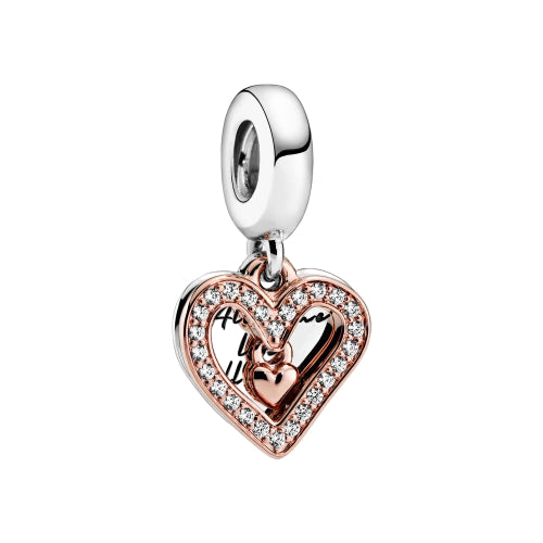Heart-shaped charm with rose gold and silver finish on a white background