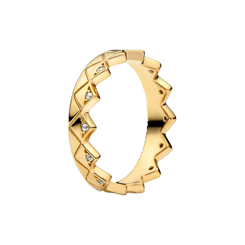 Rose Gold ring with diamond accents on a white background