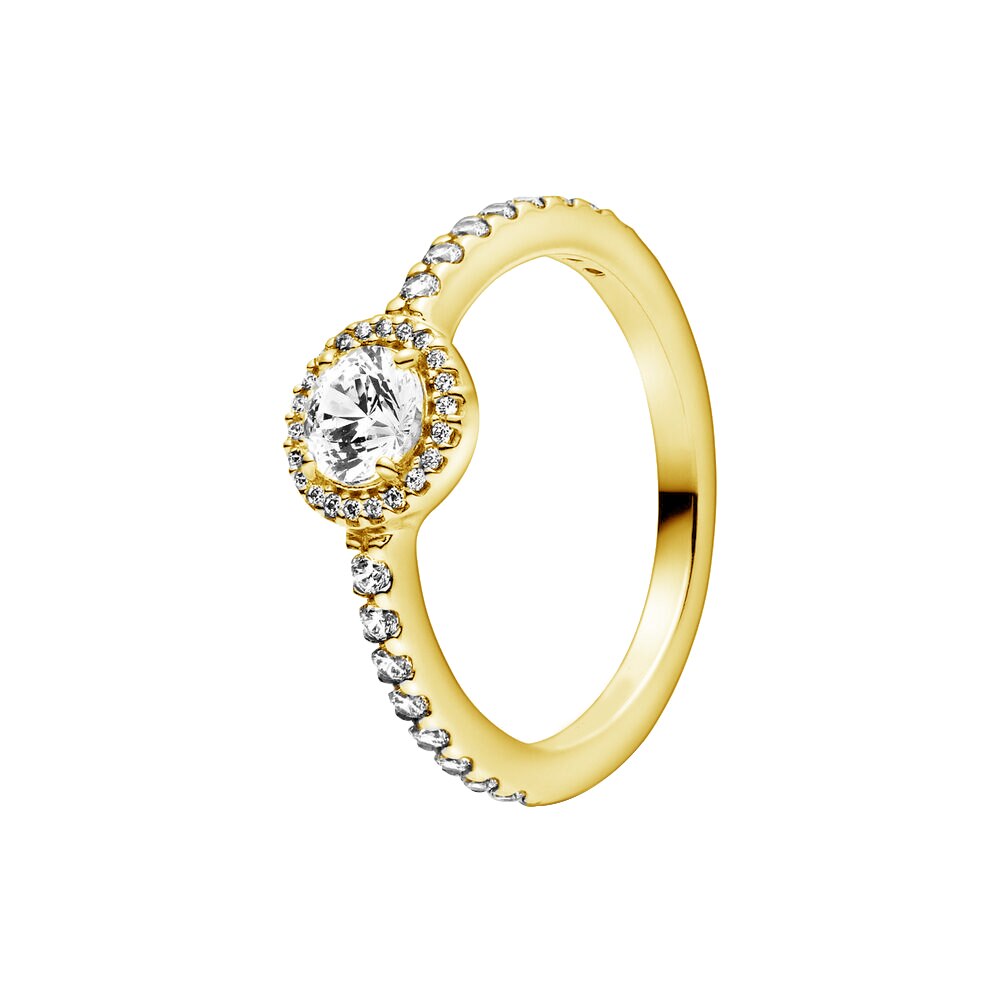 gold ring with a crystal in the middle and little crystals around it