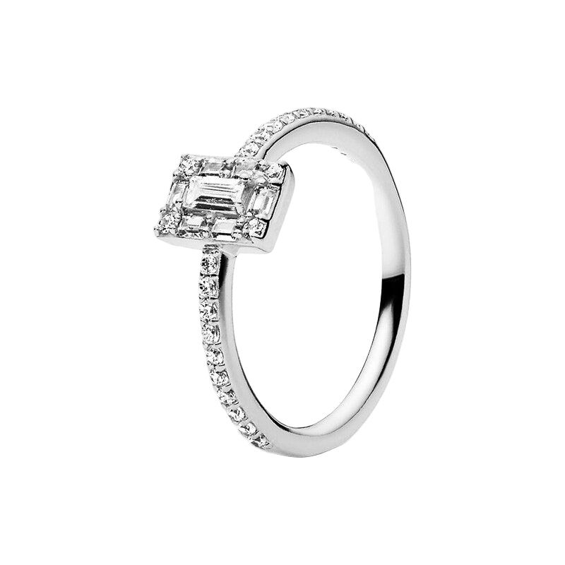 Silver ring with emerald-cut diamond and smaller diamonds on a white background